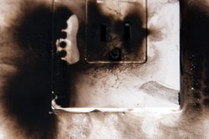 singed plug socket singed plug socket showing risk of major fire